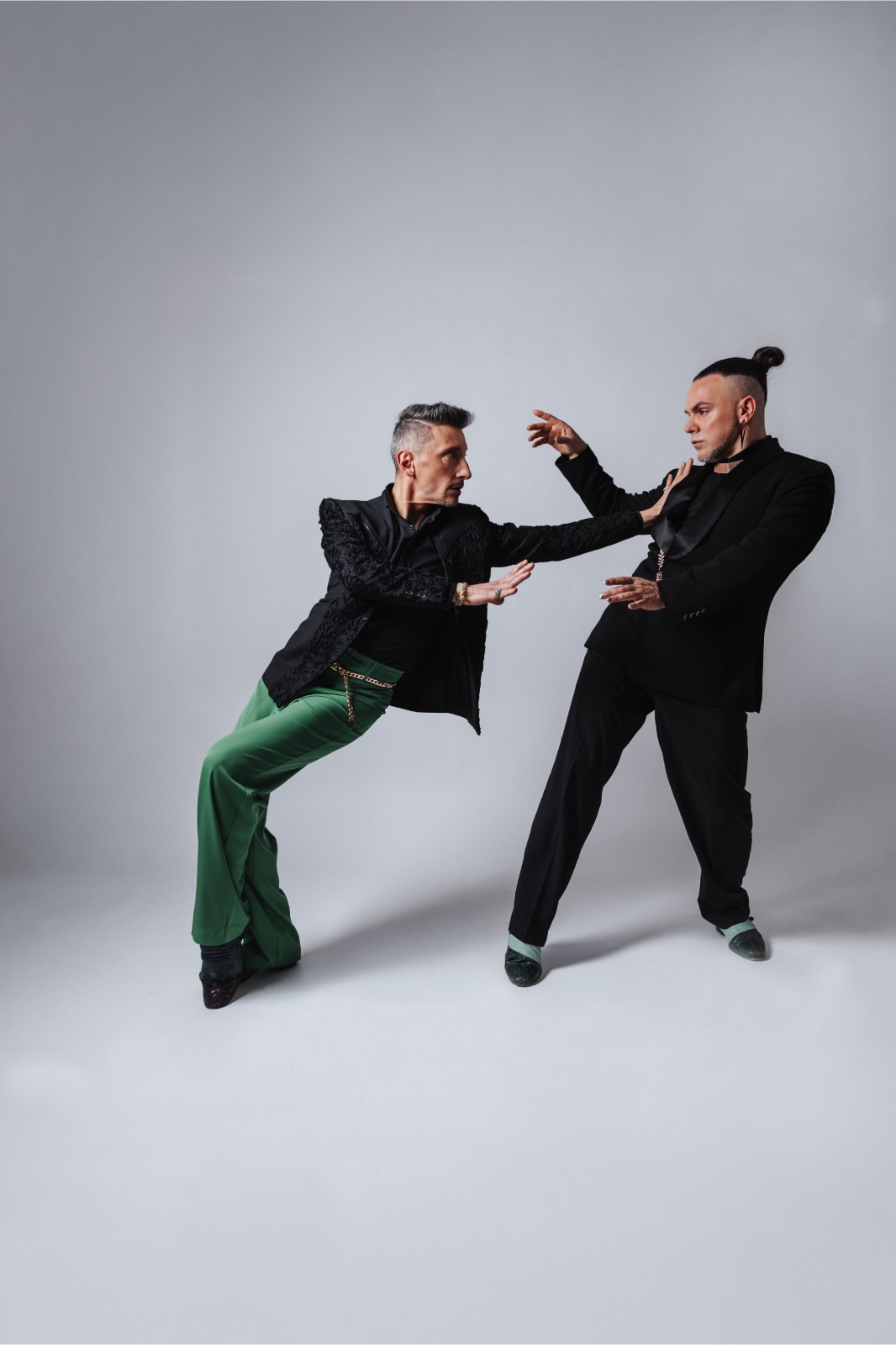 Martin Maldonado and Maurizio Ghella in motion, green and black